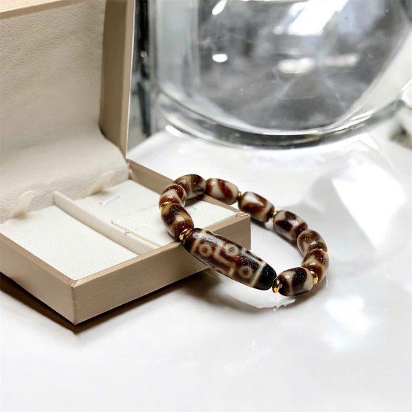Dzi 9 mắt phong hoá kết hợp dzi nanh cọp già tuổi