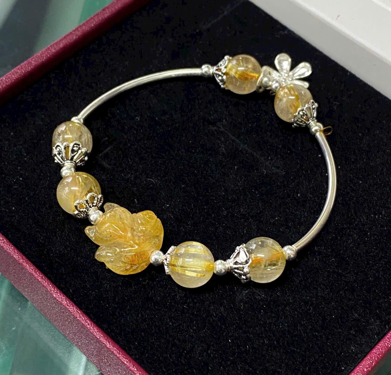 z7102043606226_90fe417a60db0a8ed595e36d9e737393 vòng tay thạch anh tóc vàng