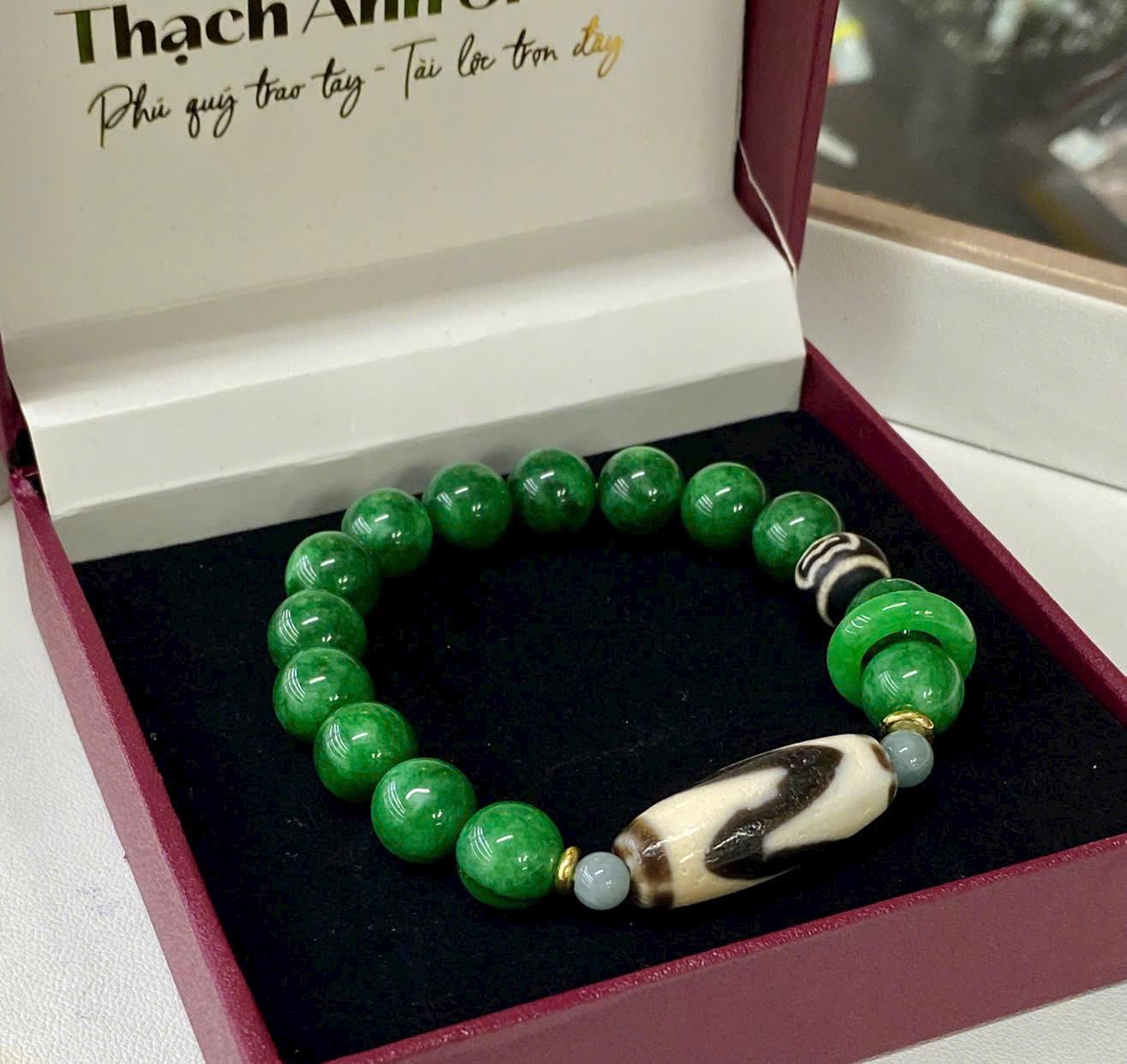 z7115715169355_6d5c2e6c54e486c912c16a95d14c2dfe Vòng tay Dzi nanh cọp mix cẩm thạch 10li – Sức mạnh, may mắn và đẳng cấp hội tụ