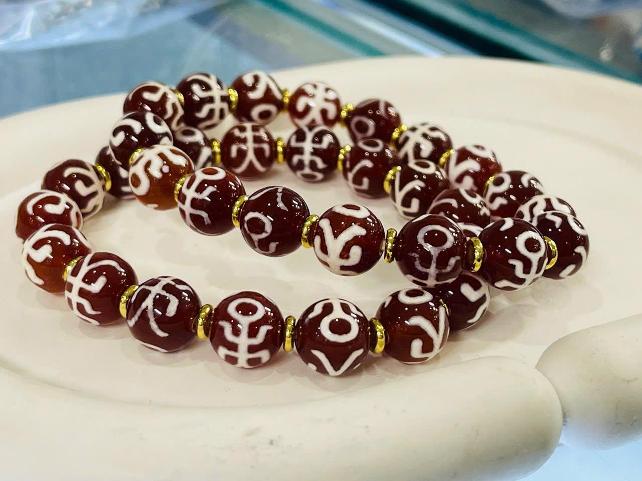 z7174344859460_b8aba26a1efec673ea1f4168bb1c3573 Vòng tay Dzi quý nhân thân huyết 10mm