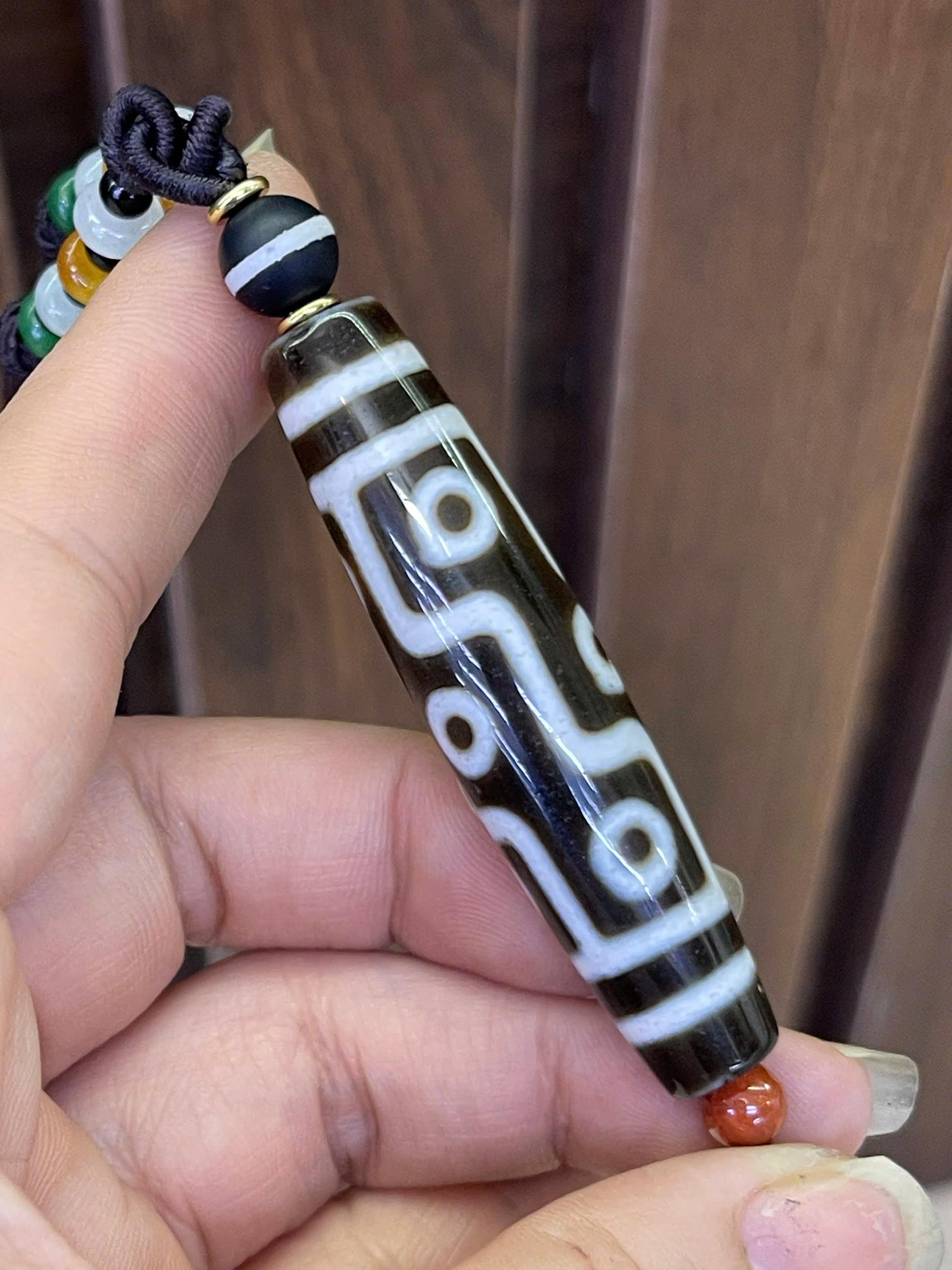 z7175774338493_bc0bf9971c0ecfac9be6f025d6cd7d4f vòng cổ dzi 9 mắt