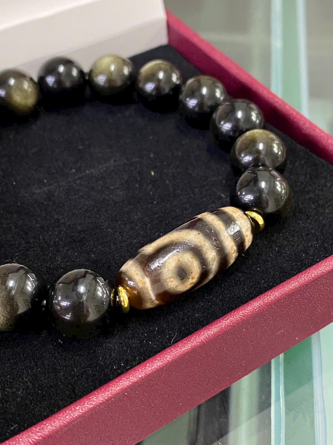 z7181989387810_790c0de913260dfe191c3e3e5b35f06c Vòng tay Obsidian ánh xà cừ mix dzi 2 mắt thấu quang