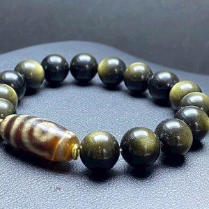 Vòng tay Obsidian ánh xà cừ mix dzi 2 mắt thấu quang