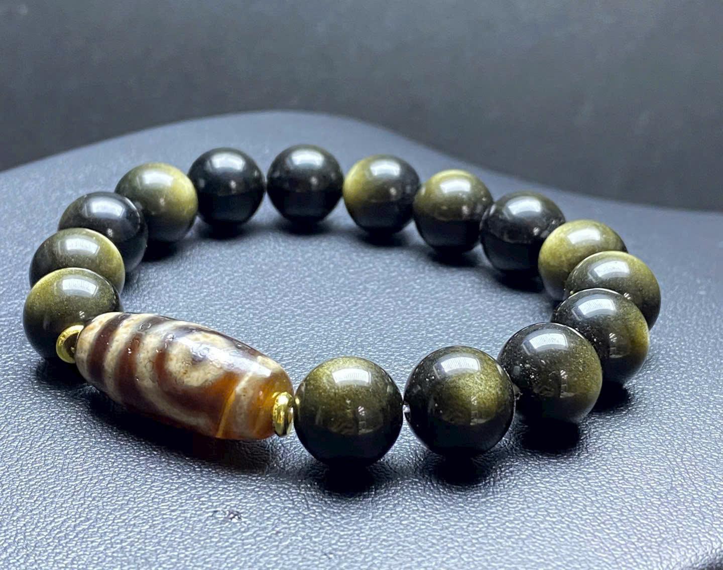 z7181989405408_8b422e8270673ff540e0e27b147292b6 Vòng tay Obsidian ánh xà cừ mix dzi 2 mắt thấu quang