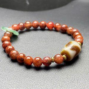 Vòng tay thạch anh tóc đỏ mix dzi nanh cọp giá 1350k