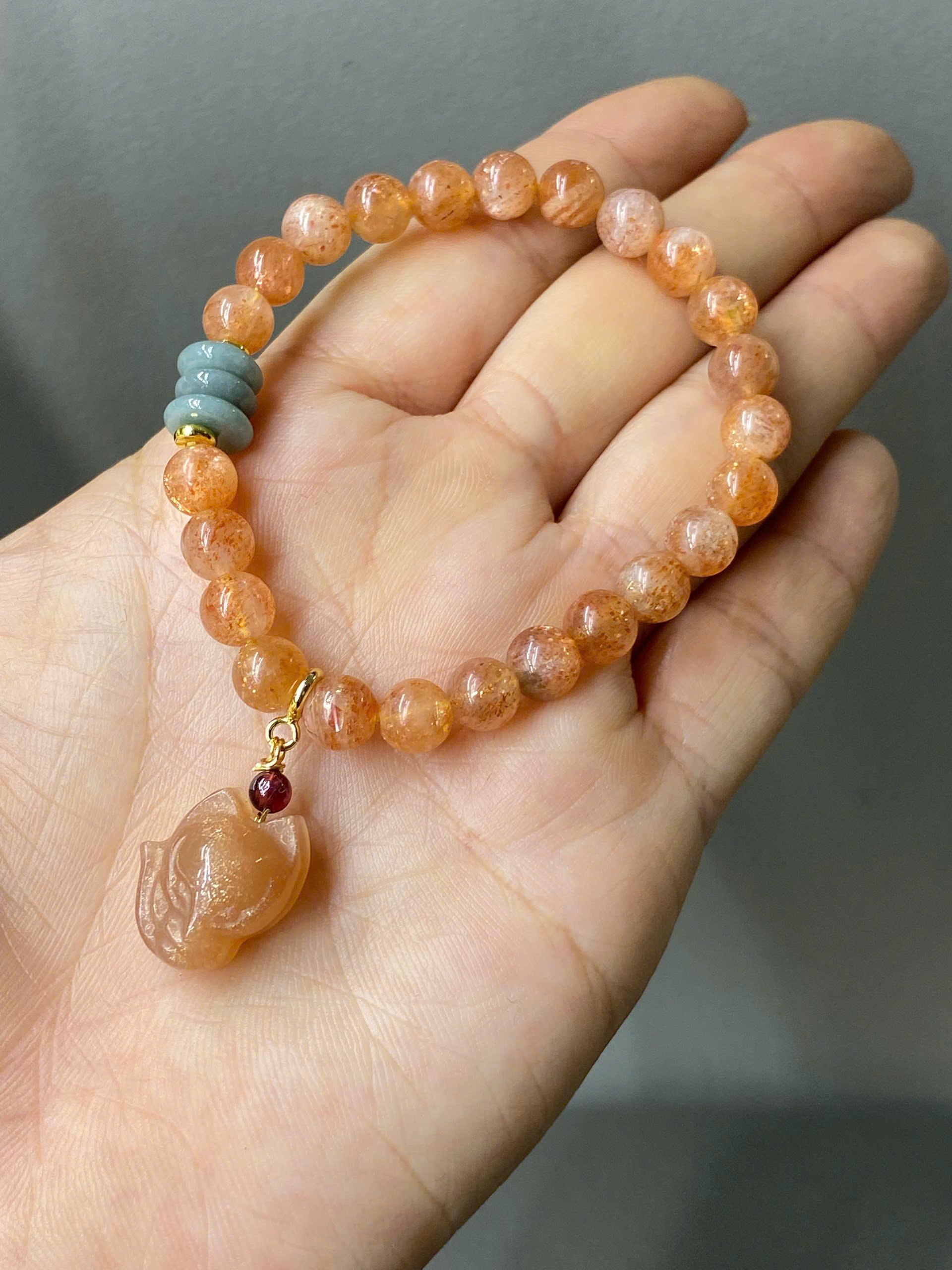 z7197858652260_4761ff71e6b42a888f40fa3501136333 Vòng tay Moonstone mix charm hồ ly – Vẻ đẹp dịu dàng, quyến rũ và tràn đầy năng lượng