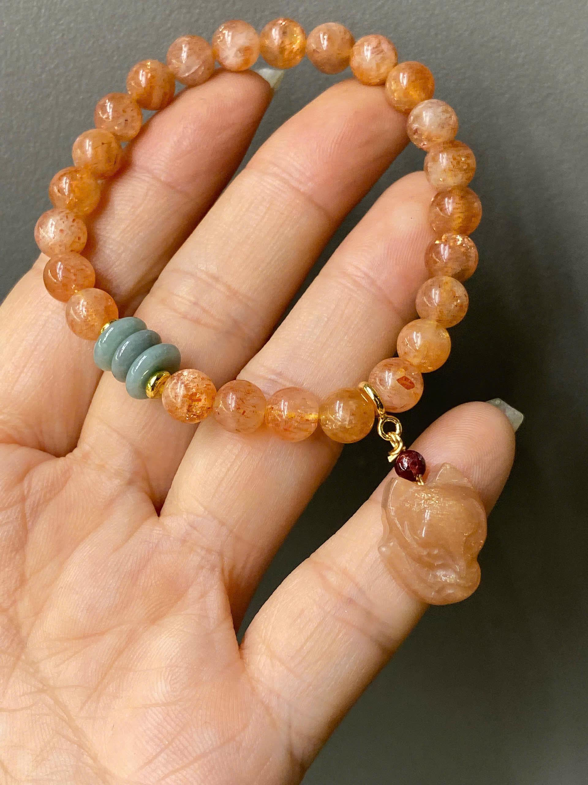 z7197858652298_d92b0149026893f879e99f0f040b0e59 Vòng tay Moonstone mix charm hồ ly – Vẻ đẹp dịu dàng, quyến rũ và tràn đầy năng lượng