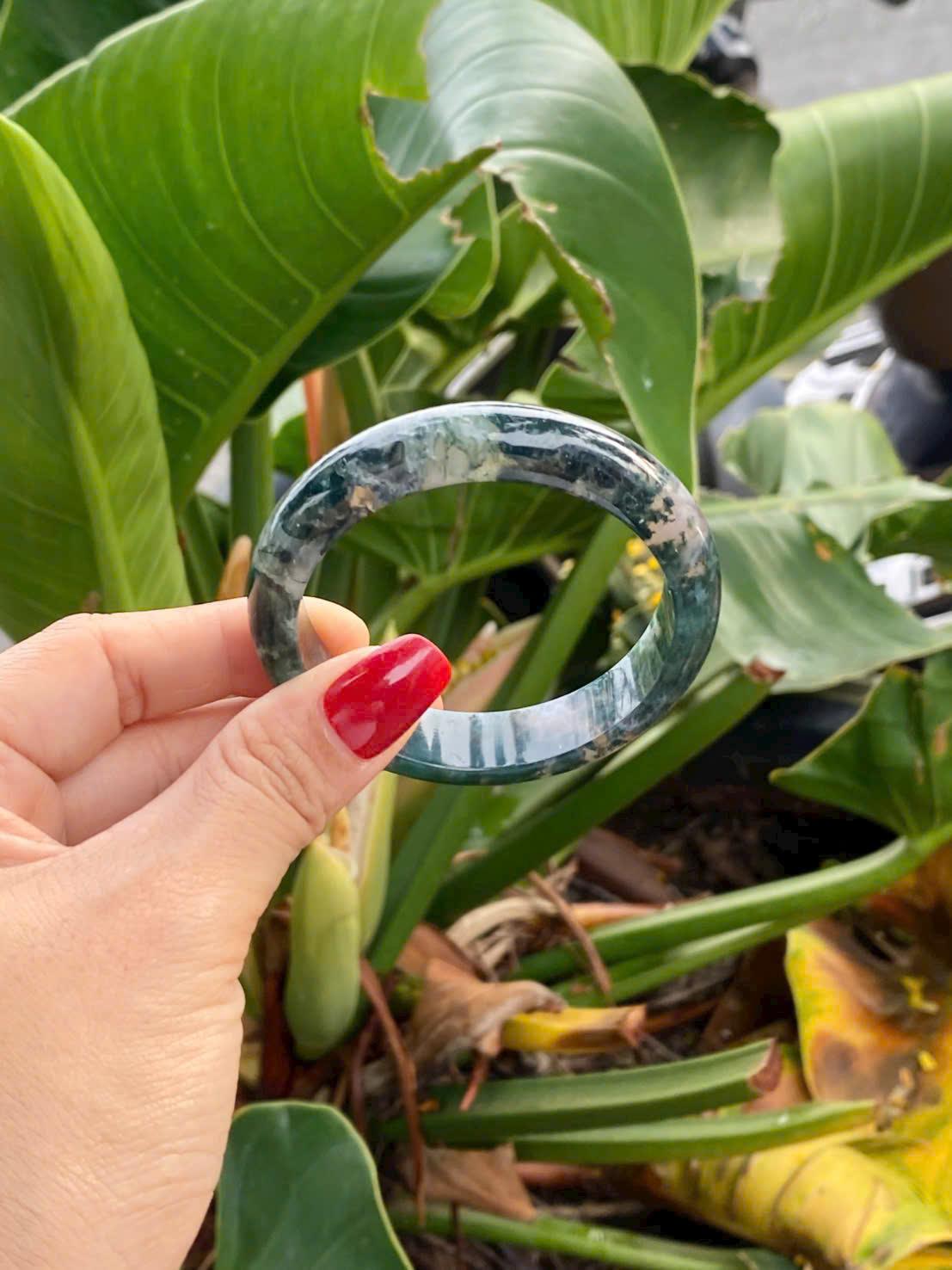 z7215948760805_1e3b604604b29c526d5708d48f2aa082 vòng chalcedony xanh rêu tại Thạch Anh Stone