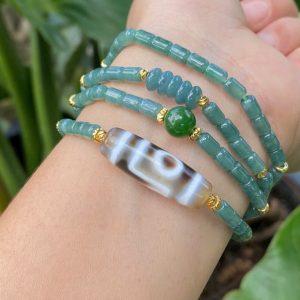 Ý nghĩa phong thủy của Dzi 1 mắt núi mix chuỗi lu lam ngọc