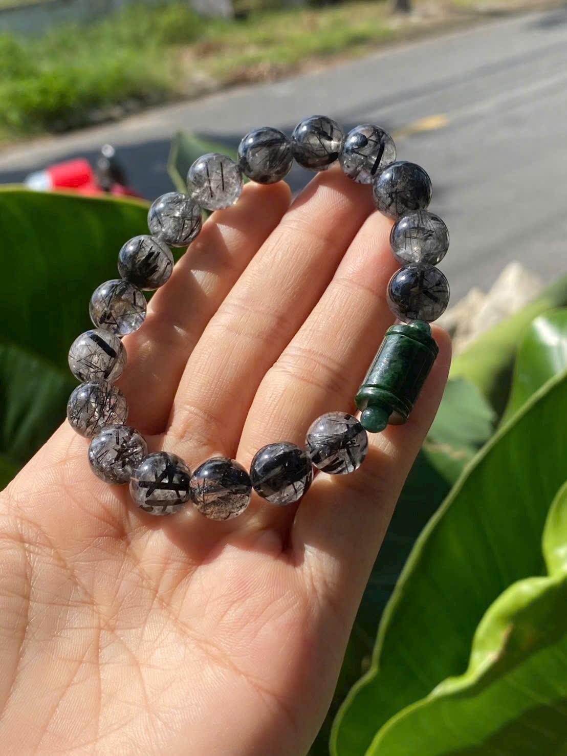 z7223302944324_f1a521593ce39ddeb07aece9c6902ebc sản phẩm chuỗi vòng tay Thạch anh tóc đen 11.2li mix lu ngọc sơn thủy