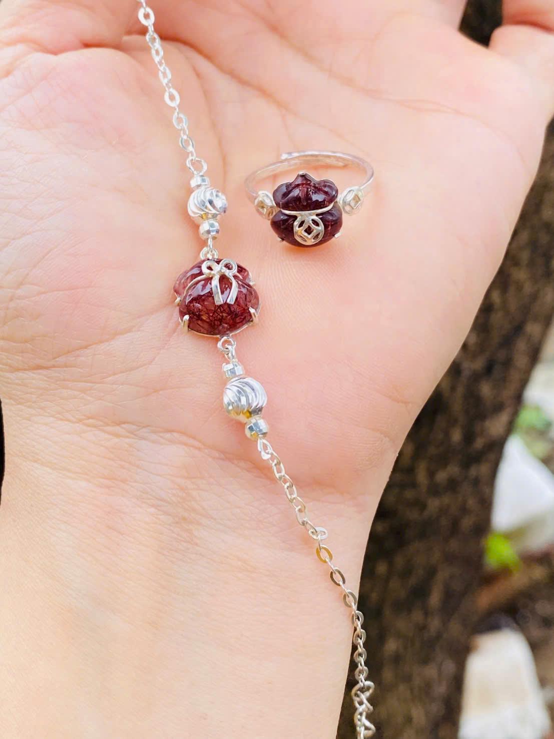 z7233386591455_15d26d009650b2b5bf37e06b680bbe1a Set túi tiền thạch anh tóc đỏ lên bạc