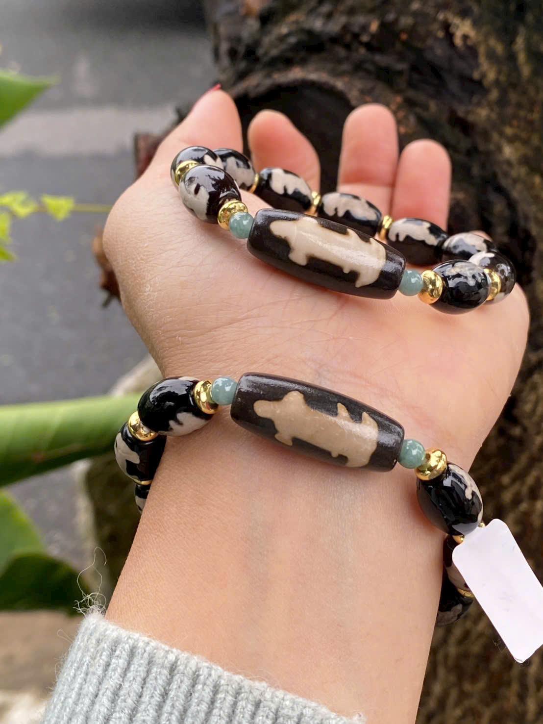 z7247479762812_c77c6ec212a8f3baaa5d30f7d3702a1f Vòng dzi Quan âm thân nâu B7250A1