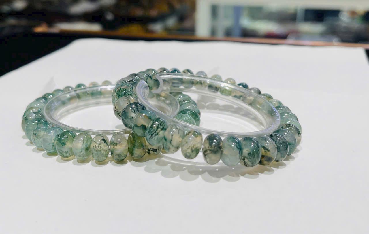 z7332867370403_2d7b8cb85fab174b546e32af653e715f Vòng bánh xe Chalcedony rêu xanh